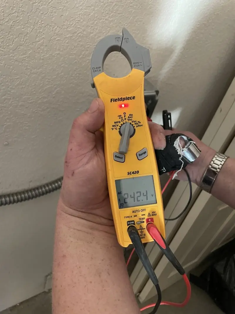 Voltage testing with clamp meter during Circuit Breaker Repair in West Allis